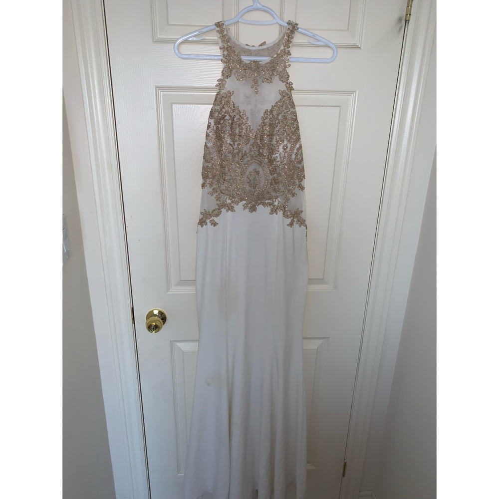 This is a beautiful prom dress from the brand xscape!